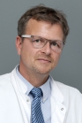 Prof. Mertens